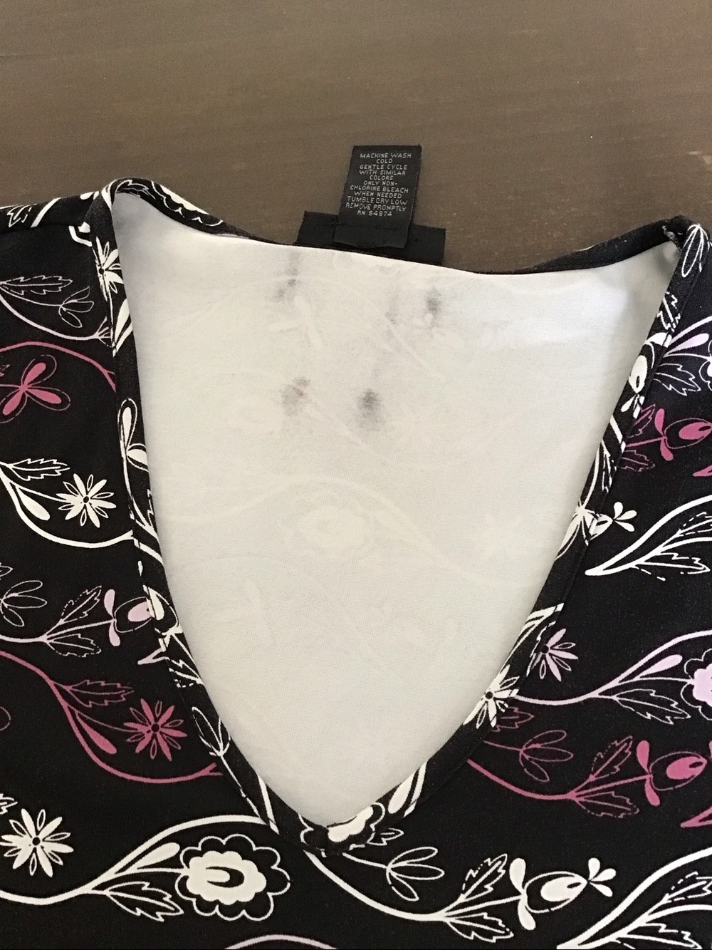 Y2K The Limited black V-neck tank top featuring a white and pink floral vine. - Picture 7 of 7